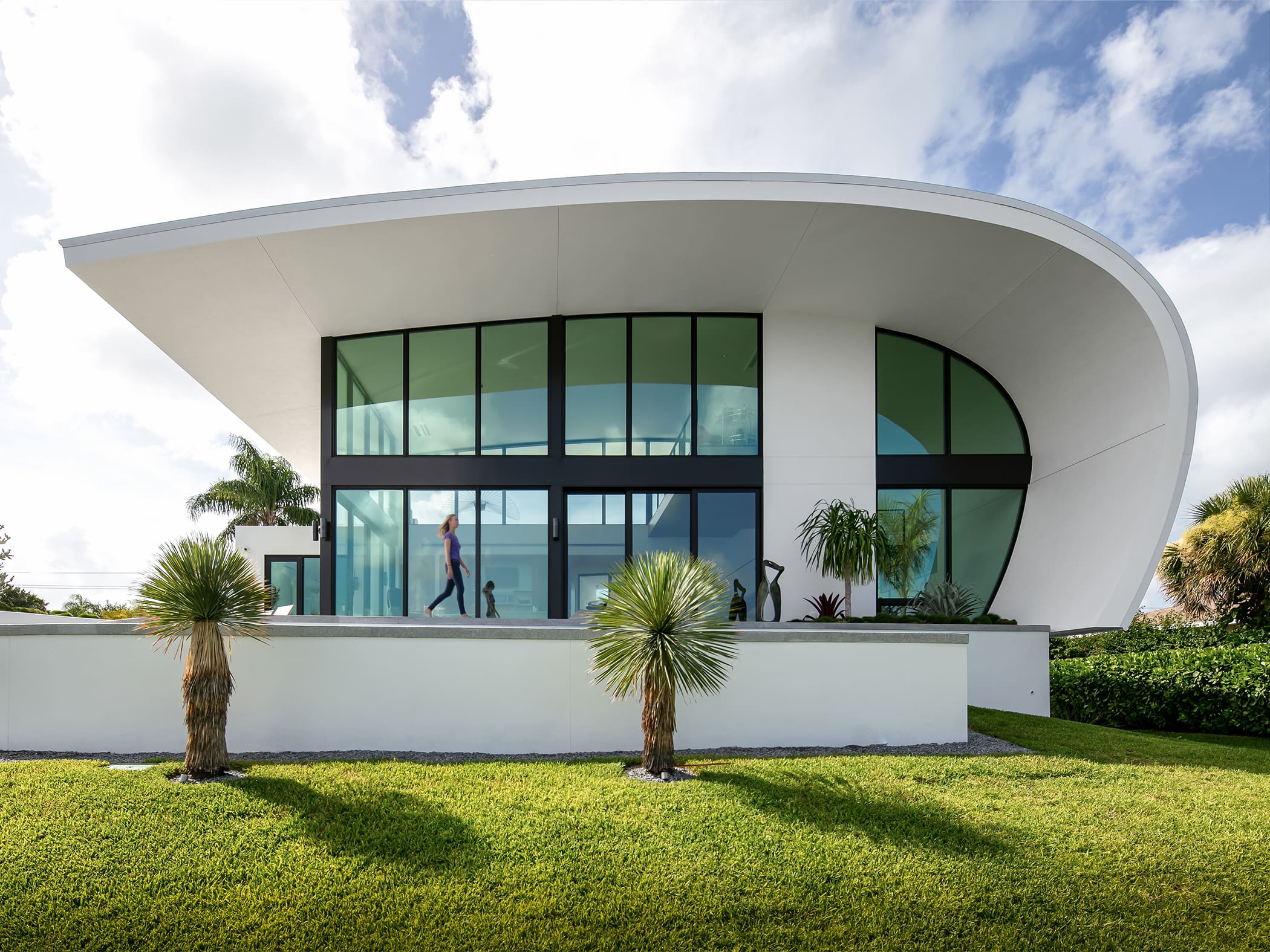 Custom home with large roof overhang for natural shade