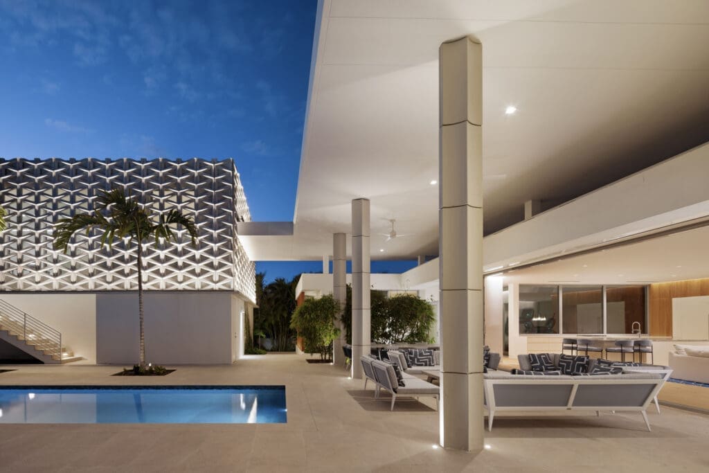 Evening view of Morningside Residence showing the relationship between architecture, light, and landscape